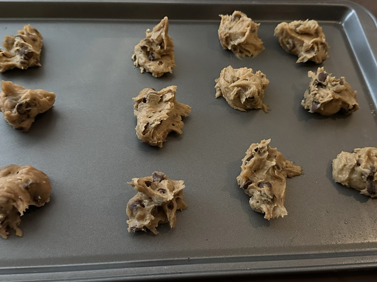 Image of Drop a heaping tablespoon of your mixture onto a cookie sheet and back for 12-14 minutes.