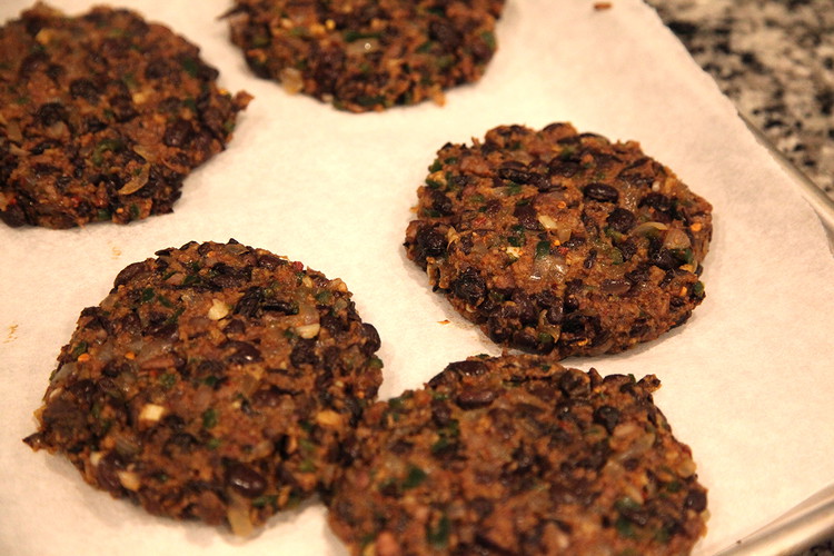 Image of Then just mix everything together, shape the goopy mix into 4-6 patties, however big you want, and place them on a parchment paper lined baking sheet. Put them in the fridge for 30 minutes at least to firm them up...