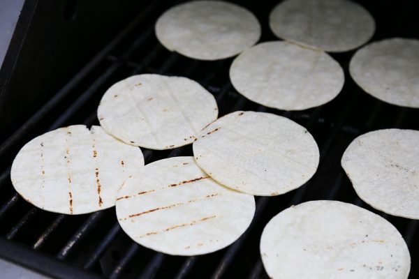 Image of Now it’s time to headStart by grilling the corn tortillas on both sides to warm them up and then wrap them in some aluminum foil or a tortilla warmer if you have one. I found one online for just a...
