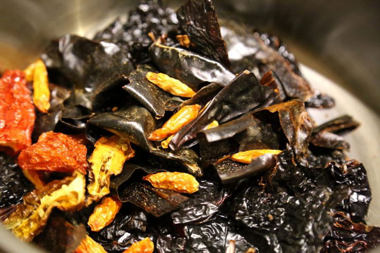 Image of Get a sauce pan and put the chili peppers in...