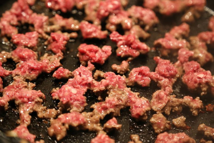Image of Set your cast iron over high heat and let it heat up until it’s smoking. You probably don’t need oil if you keep your cast iron pan well seasoned. Once it’s smoking start adding the venison, elk, and buffalo in...