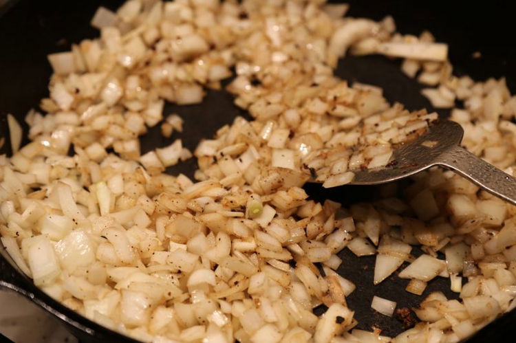 Image of I like to add the chopped onions to the pan...