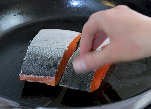 Image of Place the Coho Salmon skin up to the hot skillet....