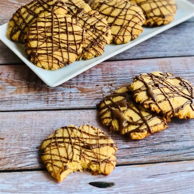 Image of CAROB DRIZZLED SOFT ALMOND COOKIES