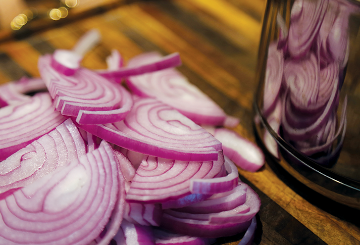 Image of Slice the onion to about 1/4 inch and add all ingredients to a small pot and heat, once it reaches a boil set a two-minute timer and then take it off the heat, pour it in a jar or other...