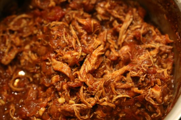 Image of Start checking the shredability of the chicken pieces by giving them a good poke after an hour and a half. Shred it once it pulls apart easily or serve the pieces whole smothered in the sauce. If you have to...