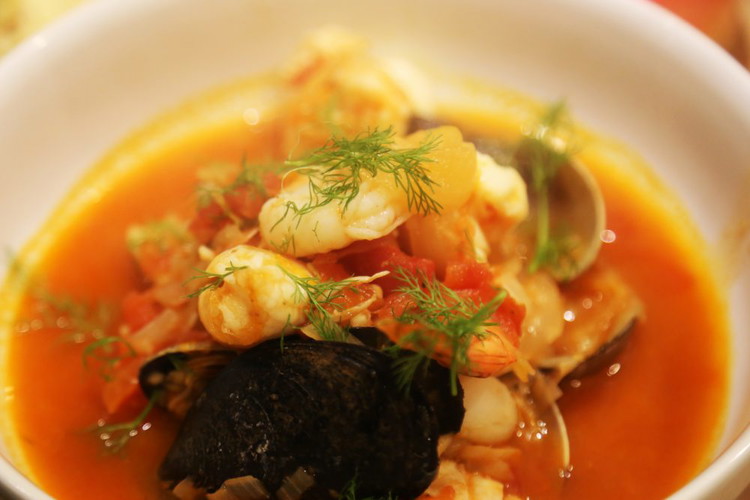 Image of Ladle the soup into bowls, top with some leftover fennel fronds and serve.