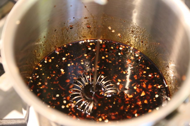 Image of Combine all of the ingredients except the cornstarch and water into a small sauce pot and turn up to medium heat. Combine the room temperature water and corn starch and add that to the pot once it boils. Stir until...