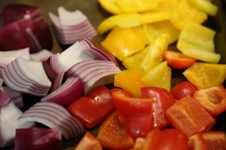 Image of Cut the peppers and onion and pineapple approximately 1-1.5 inches and place on a cookie sheet in piles which makes for easy clean up. Thinly slice the jalapeños (the pineapple jalapeño combo is amazing).