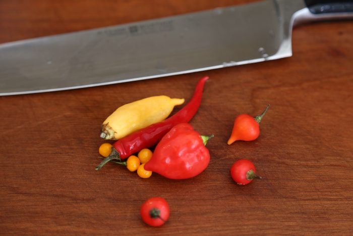 Image of Top BunLettuceKetchupTomatoCheeseJalapeñosBurgerOnionMayoBottom Bun