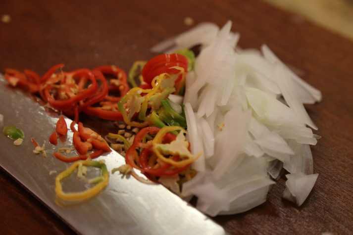 Image of VERY Thinly slice habaneros and onions with a super sharp...