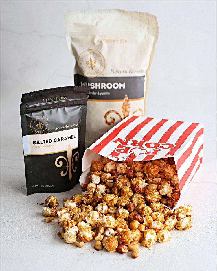 Image of Combine the popped popcorn and peanuts in a large bowl.