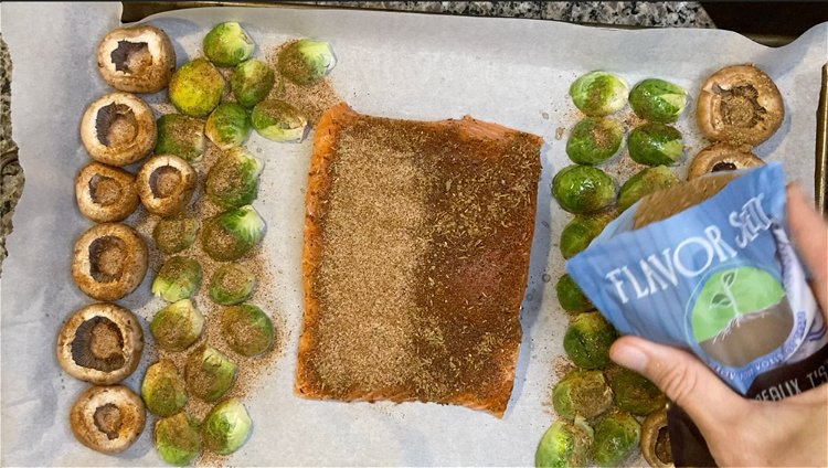 Image of Place salmon on sheet pan and season with Boudreaux T’s