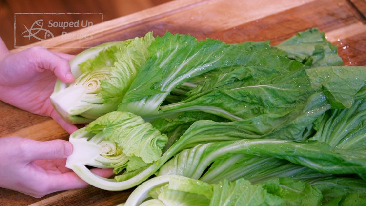 Image of Discard the end of the mustard green. Cut each of...