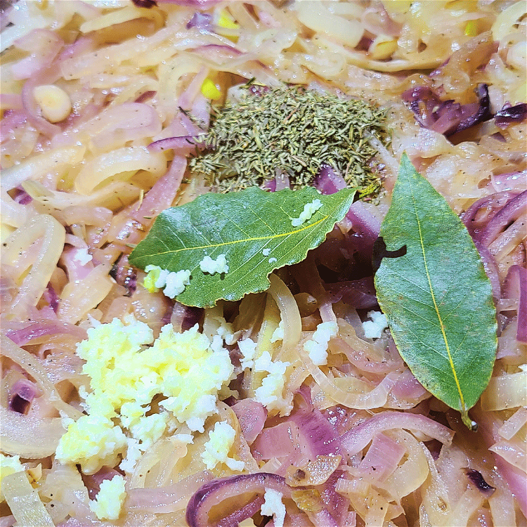 Image of Add the garlic, bay leaves, thyme and salt, stir and...