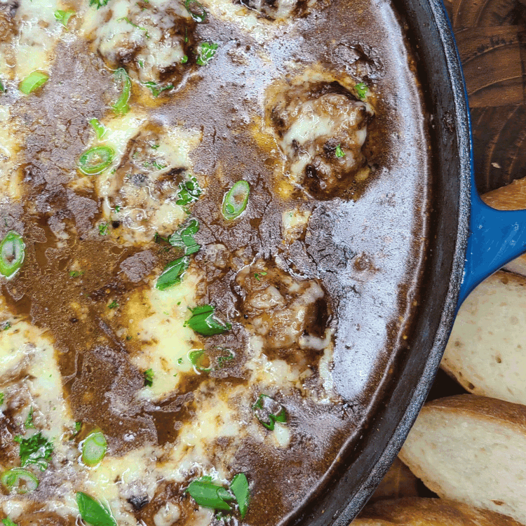 Image of Preheat the broiler on low. Sprinkle the cheese over the meatballs and sauce and broil until the cheese is melted, about 2 minutes.