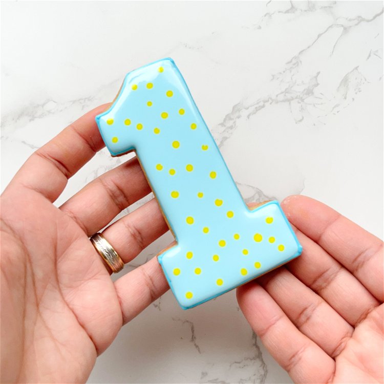 Image of You can serve these cookies as-is, or you can pipe additional designs or add royal icing transfers to create more dimension. This universal technique works for a broad range of shapes and a variety of themes. 