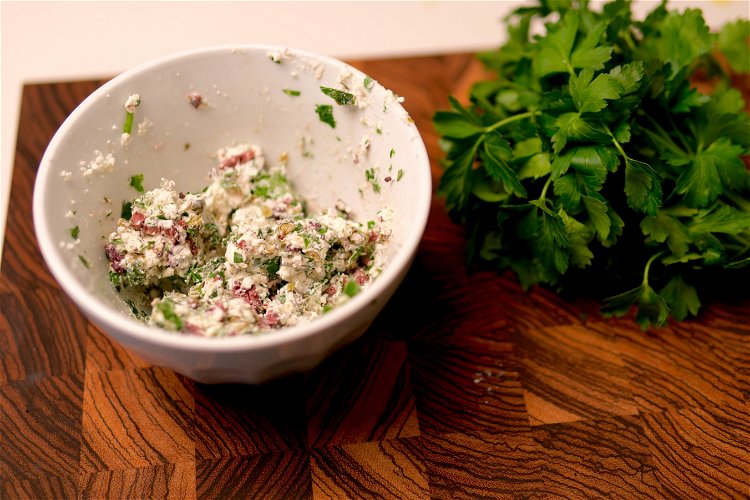 Image of While the eggplant roasts you can prepare the filling by...