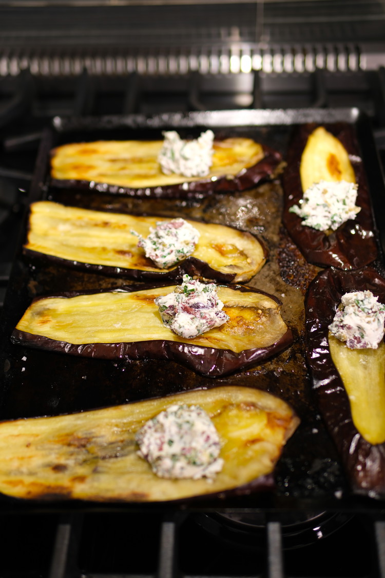 Image of Add about one tablespoon of filling to each eggplant slice and roll the eggplant carefully.  You may be tempted to add more cheese but do not—it is strongly flavored and can overpower the dish if the eggplant rolls are overly...