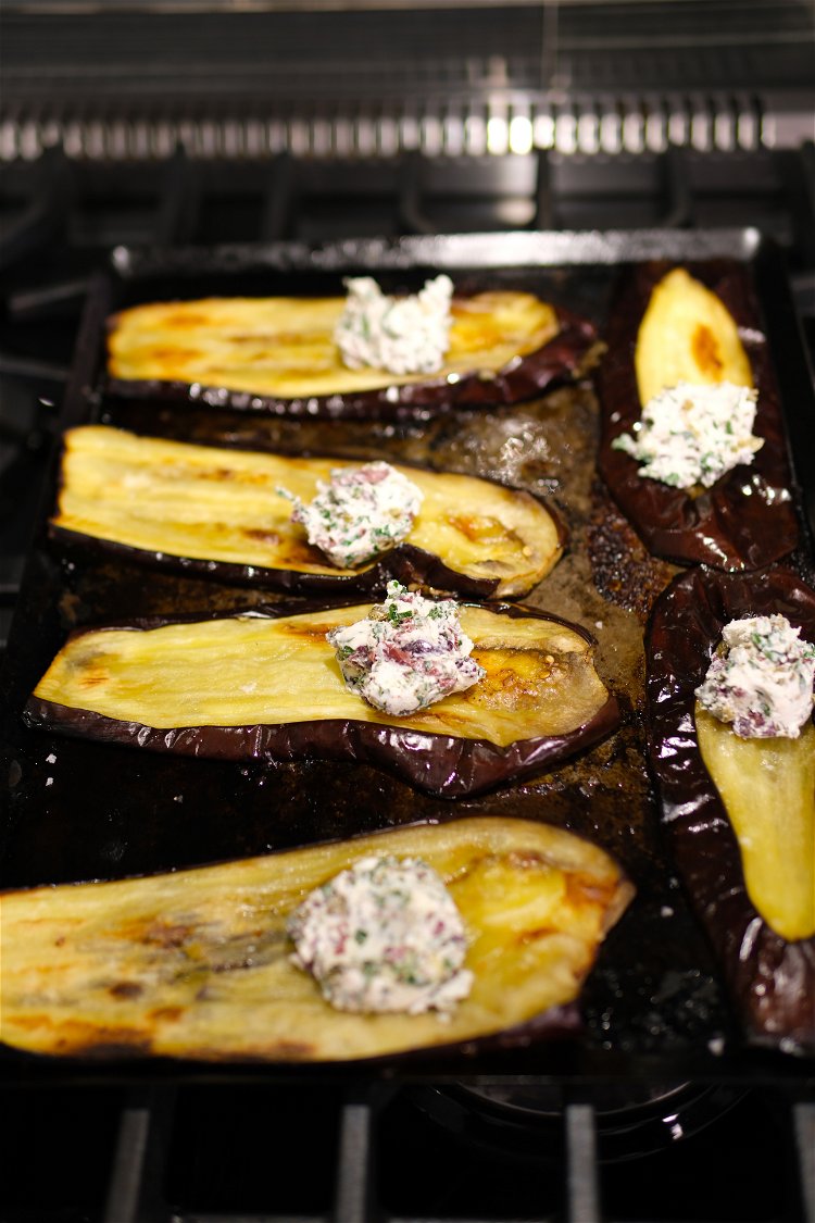 Image of Add about one tablespoon of filling to each eggplant slice...