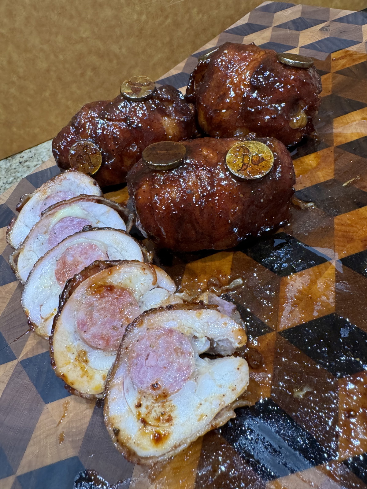 Bacon Wrapped Cheesy Smoked Sausage Stuffed Chicken Thighs!