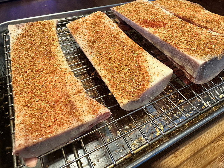 Image of Mix rub and sprinkle over the top of beef marrow bones