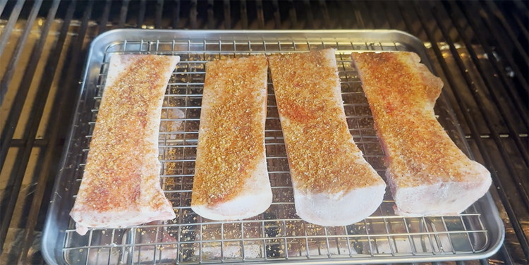 Image of Place beef marrow bones in your smoker for 1 hour