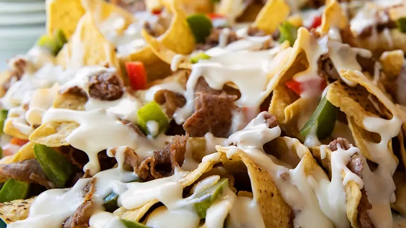Image of Cooper® Philly Cheesesteak Nachos Your Heart Will Beat Faster for