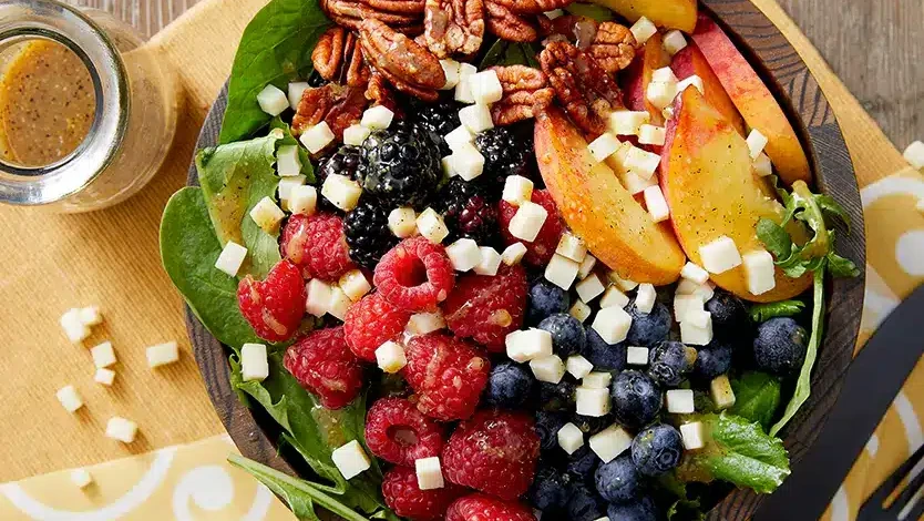 Image of Cooper® Cheese Fruit and Nut Salad with Honey Mustard Dressing