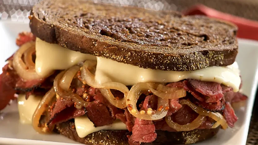 Image of Pastrami and Cooper® Cheese Panini is in a New York State of Mind