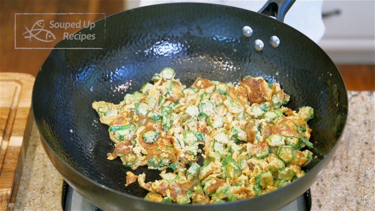 Image of Once the egg is set, use you spatula to flip...