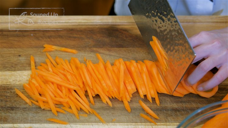 Image of Peel the carrots, cut them into 1/8-inch thick slabs, then...