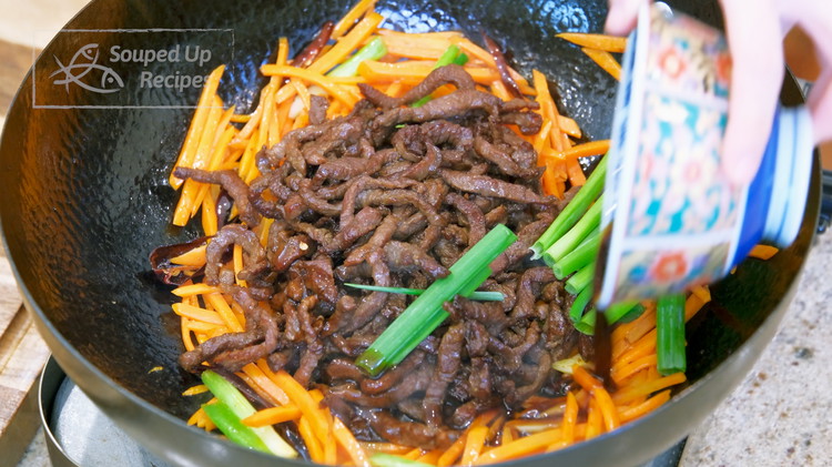 Image of Introduce the beef back into the wok and pour in the seasoning sauce. Last, toss in the green part of the scallion. Mix well and serve with white rice.