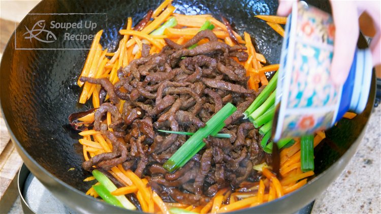 Image of Introduce the beef back into the wok and pour in...
