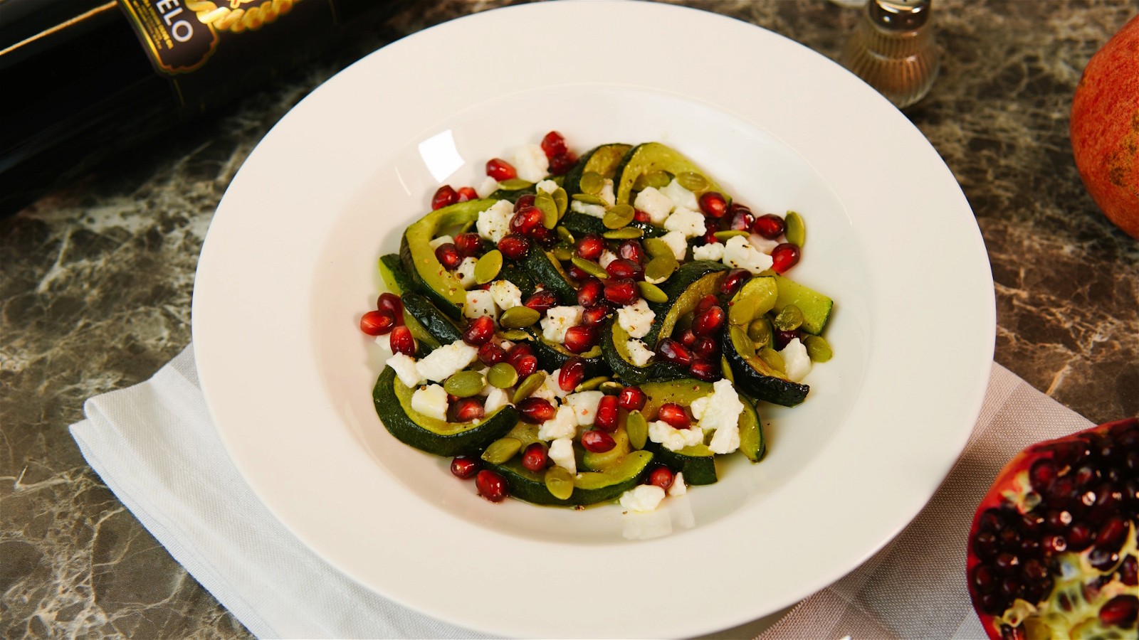 Image of Delicata Squash with Goat Cheese and Pomegranate Seeds