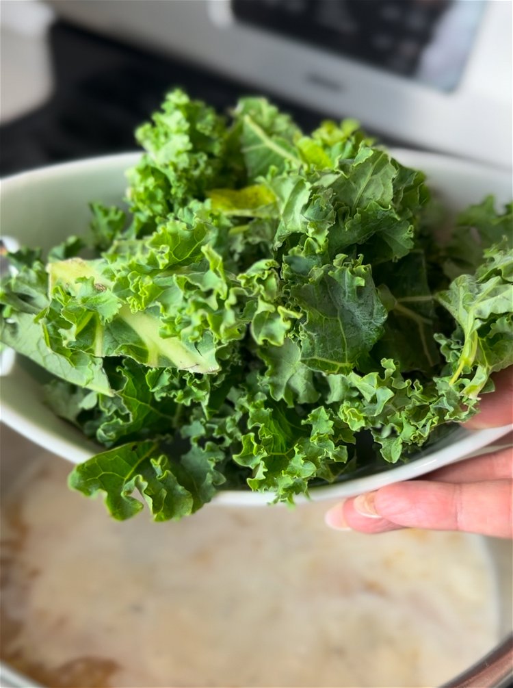 Image of Add in kale and cook on low for an additional...