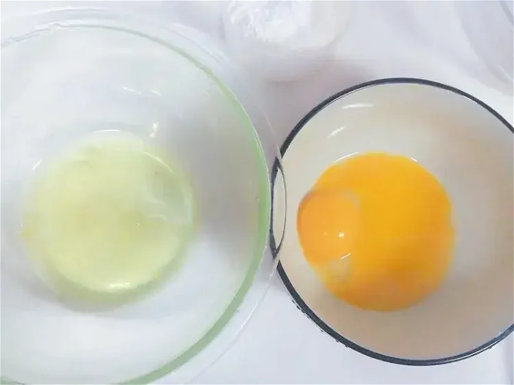 Image of Egg Preparation: Separate eggs, placing whites in a clean, dry...