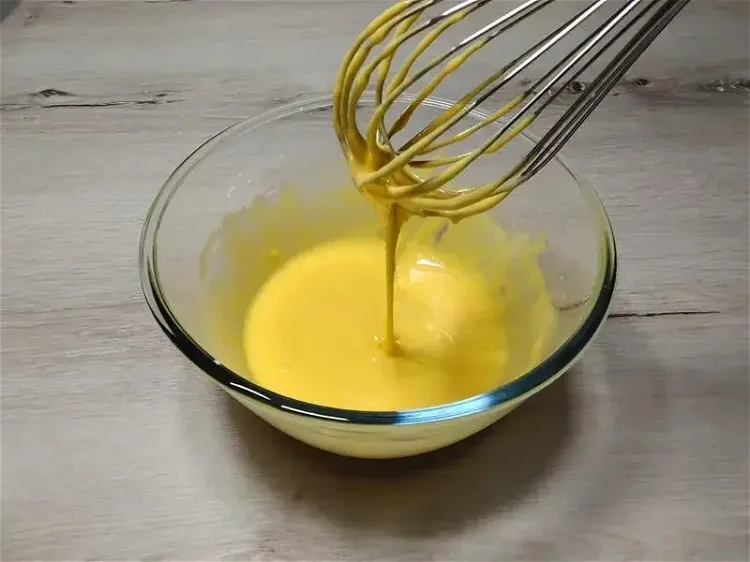 Image of Mix Dry Ingredients: Whisk cake flour, cornstarch, and salt into...