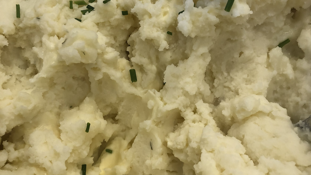 Image of Mashed Potatoes With Roasted Garlic and Chive Butter