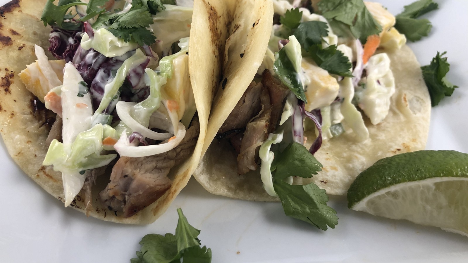 Pork Tacos with Spicy Mango Slaw