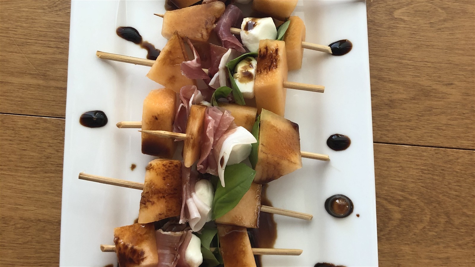 Image of Melon and Prosciutto Caprese Skewers