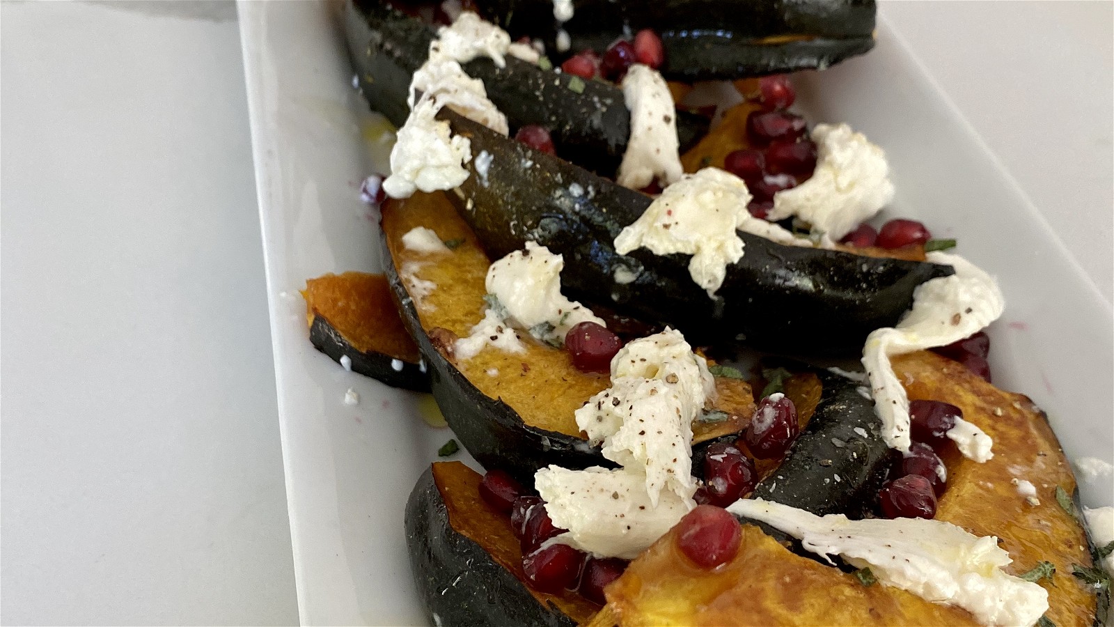Roasted Acorn Squash with Pomegranate and Burrata