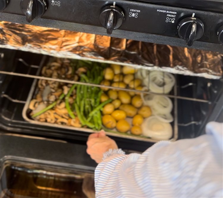 Image of roast veggies in oven for 20 minutes. 