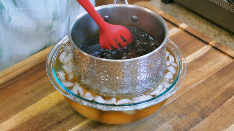 Image of If you are making the running yolk tea eggs, you also need to cool the tea brine. Just place the pot into the ice water and swirl it around. The liquid should cool within 3 minutes because the stainless steel...
