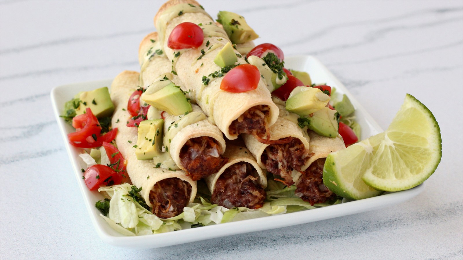 Image of Chicken Taquitos with Avocado Lime Sauce