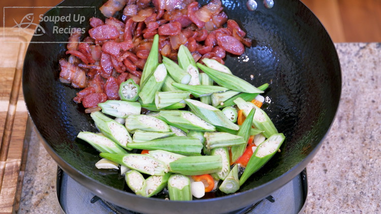 Image of Add the okra and stir for 2-3 minutes. We want the bacon fat to coat the cut surface. This step is important because the oil sears the cut surface and prevents the soluble fiber for leaking so your dish will...