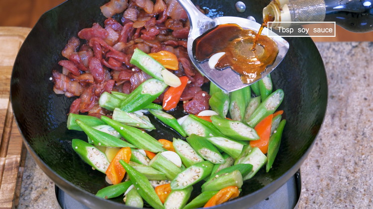 Image of Drizzle in 1 Tbsp of soy sauce and mix well. Then thoroughly stir the okra with the cured meat and you are done.