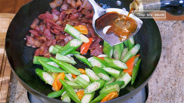 Image of Drizzle in 1 Tbsp of soy sauce and mix well....