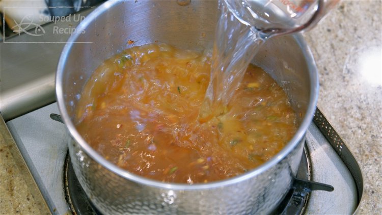 Image of Pour in 3 cups of water. You can use vegetable...