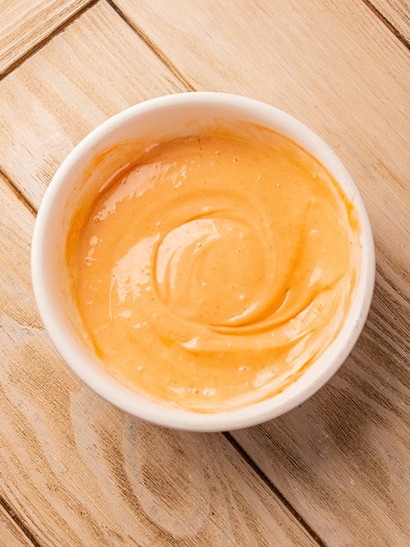 Image of Make Dipping Sauce: Stir together ingredients for sriracha mayonnaise in...
